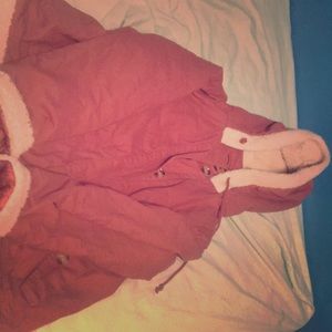 A maroon pink red  jacket